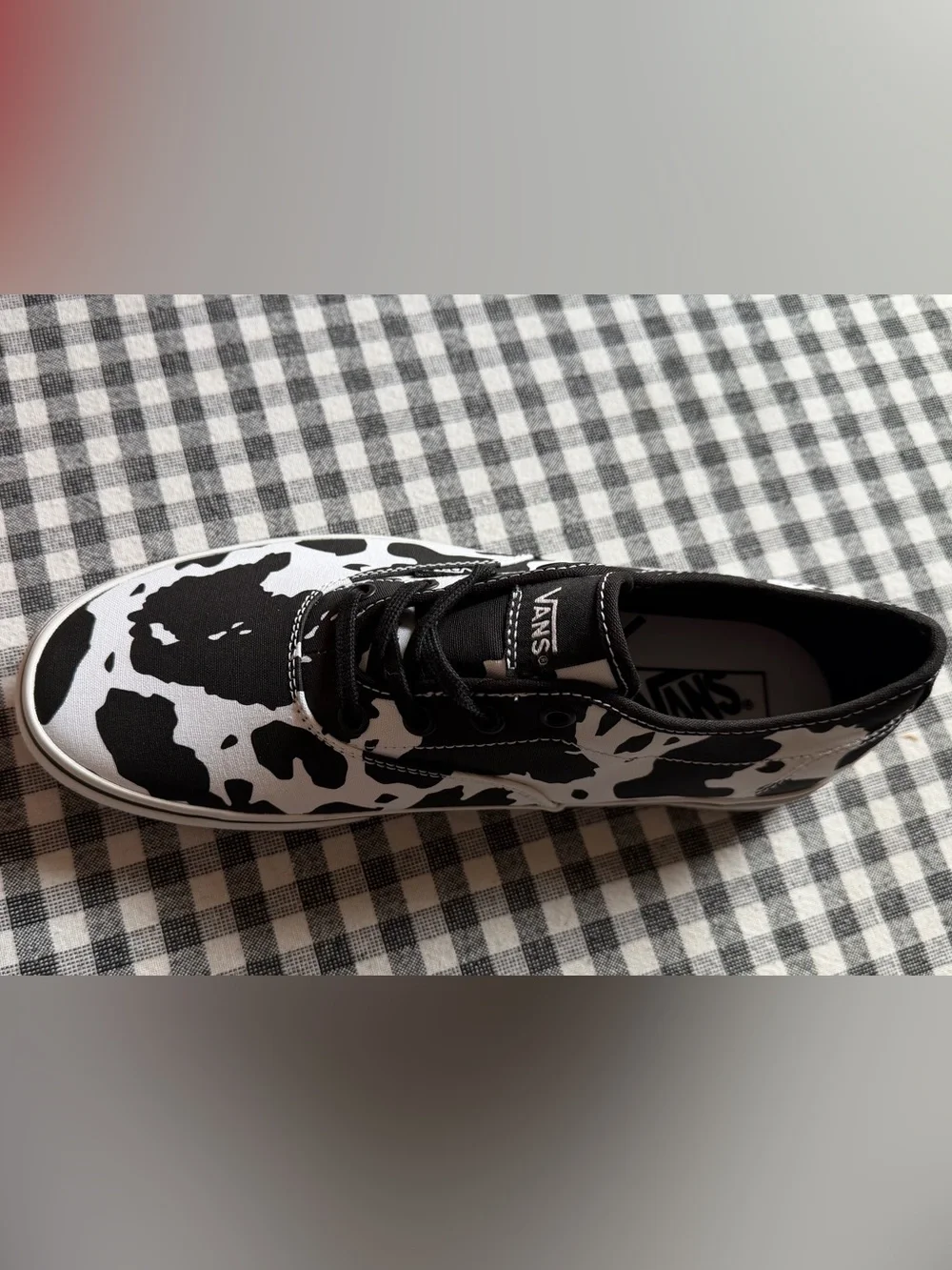 Vans Women’s Cow Print Slip-Ons